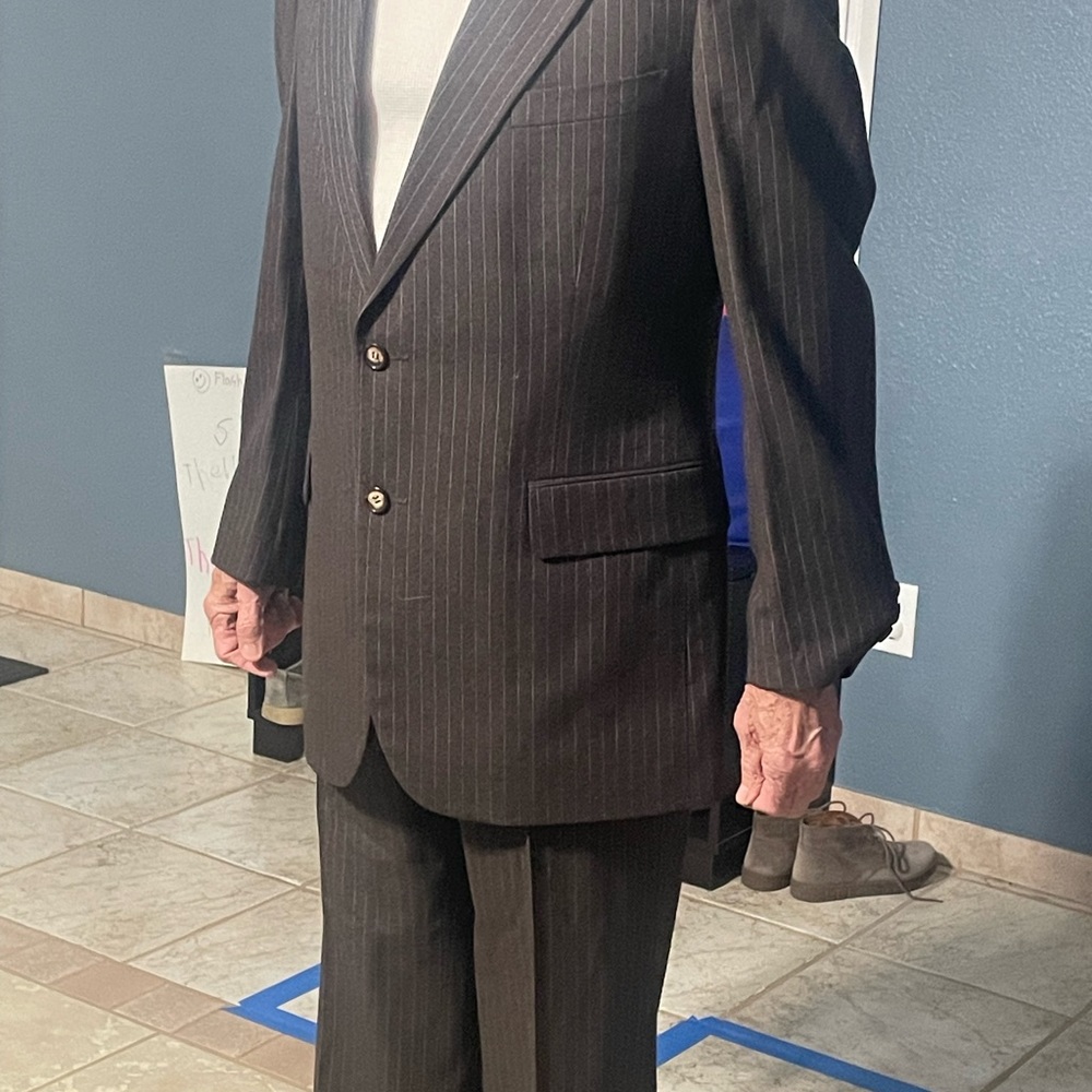 Brown with light gray pin stripes suit size 42R. FREE tie with coat